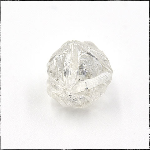 Rough octahedron crystal with ribbed edges