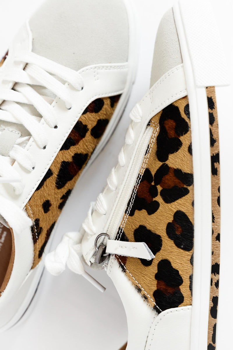 white and cheetah print sneakers