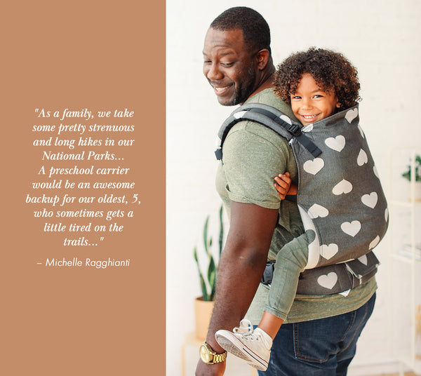 A father carrying his Preschooler in a Preschool Carrier from Baby Tula in back-carry position.