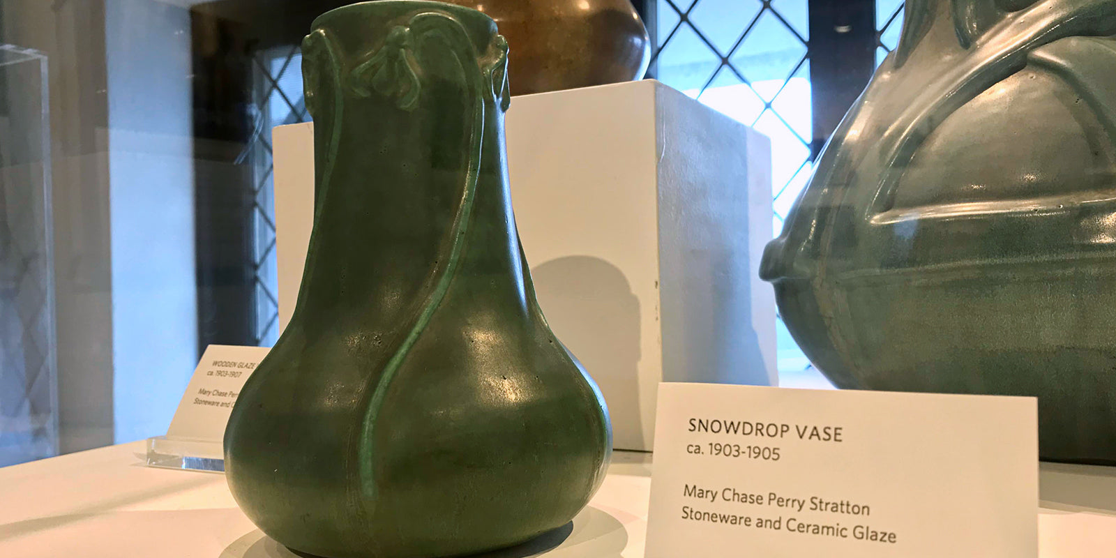 Historic Snowdrop vase in Pewabic’s museum collection on the second floor of the pottery.