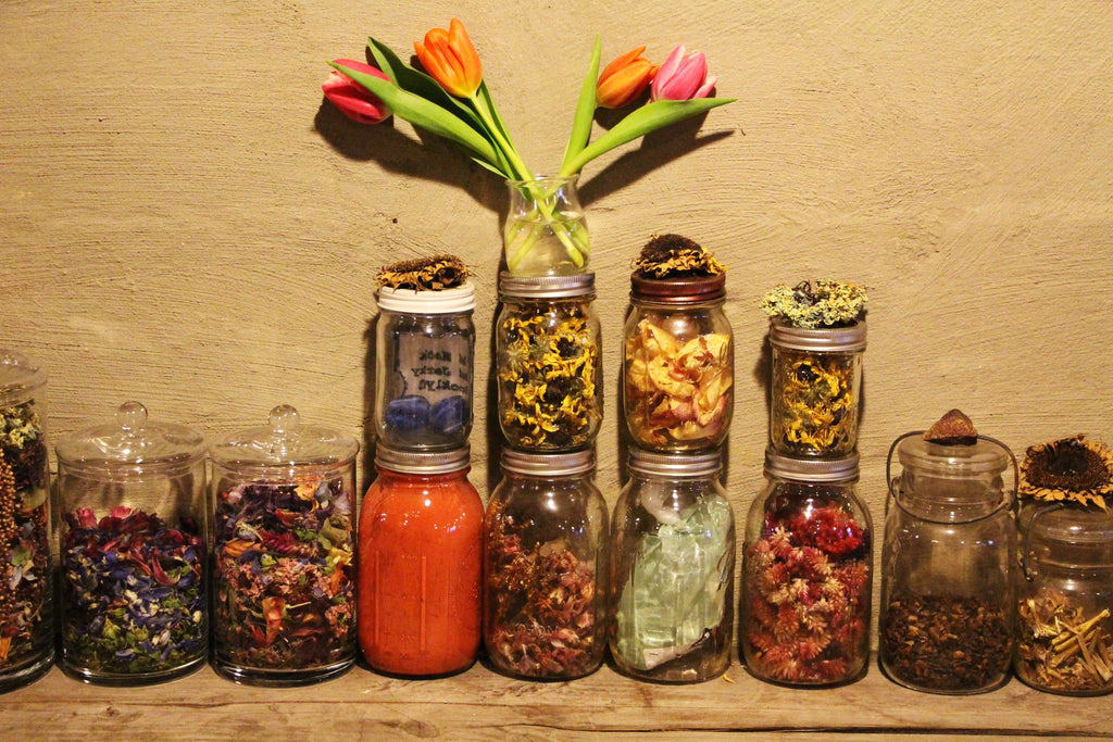 dried flowers for dye in glass jarss