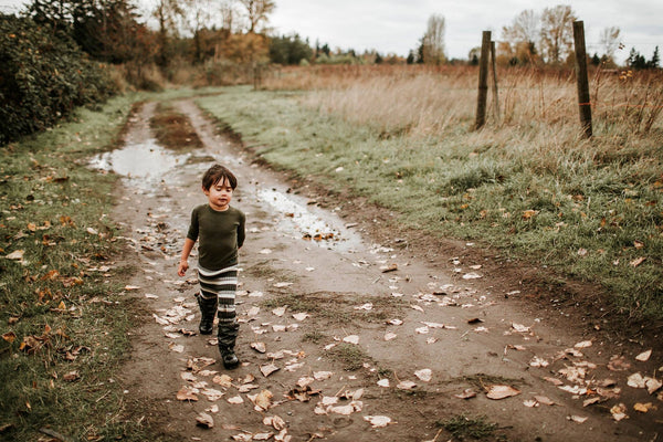 boy in a woods wearing base layer