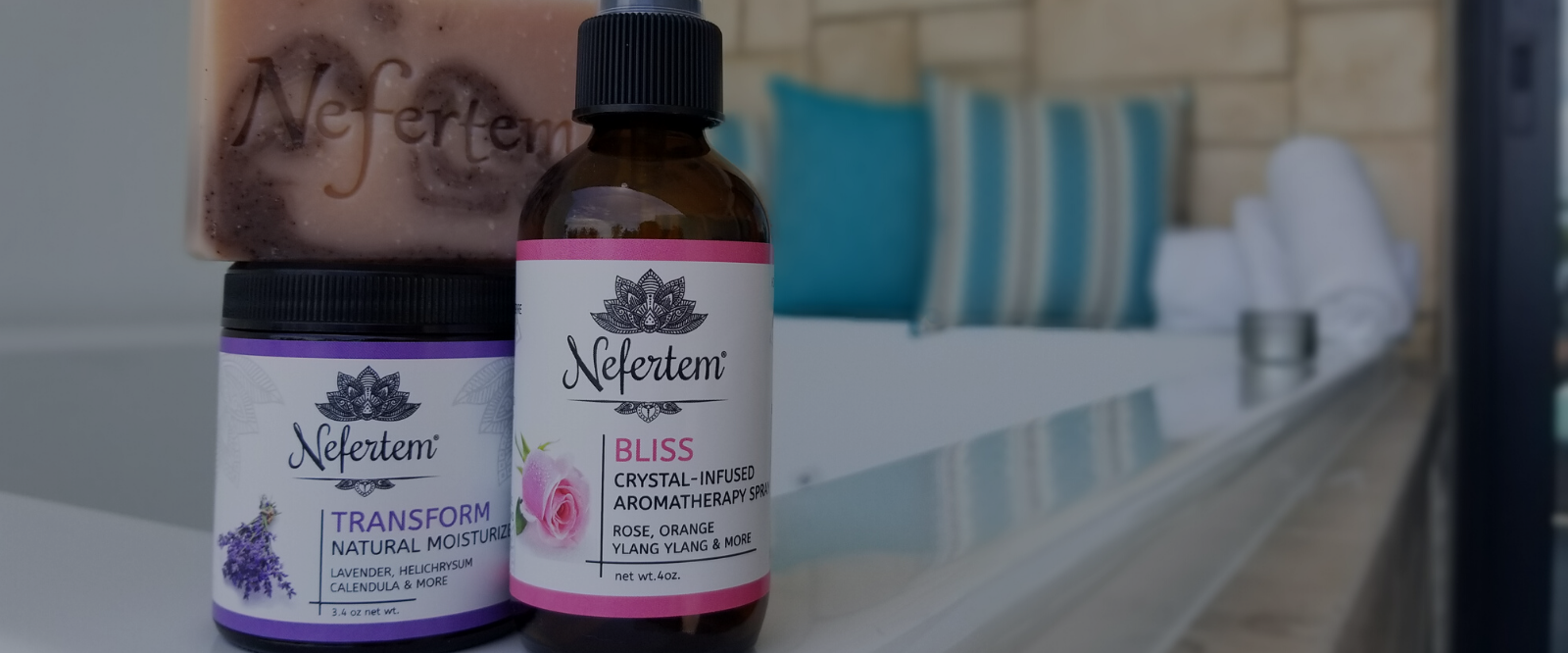 nefertem holistic skin care on side of tub