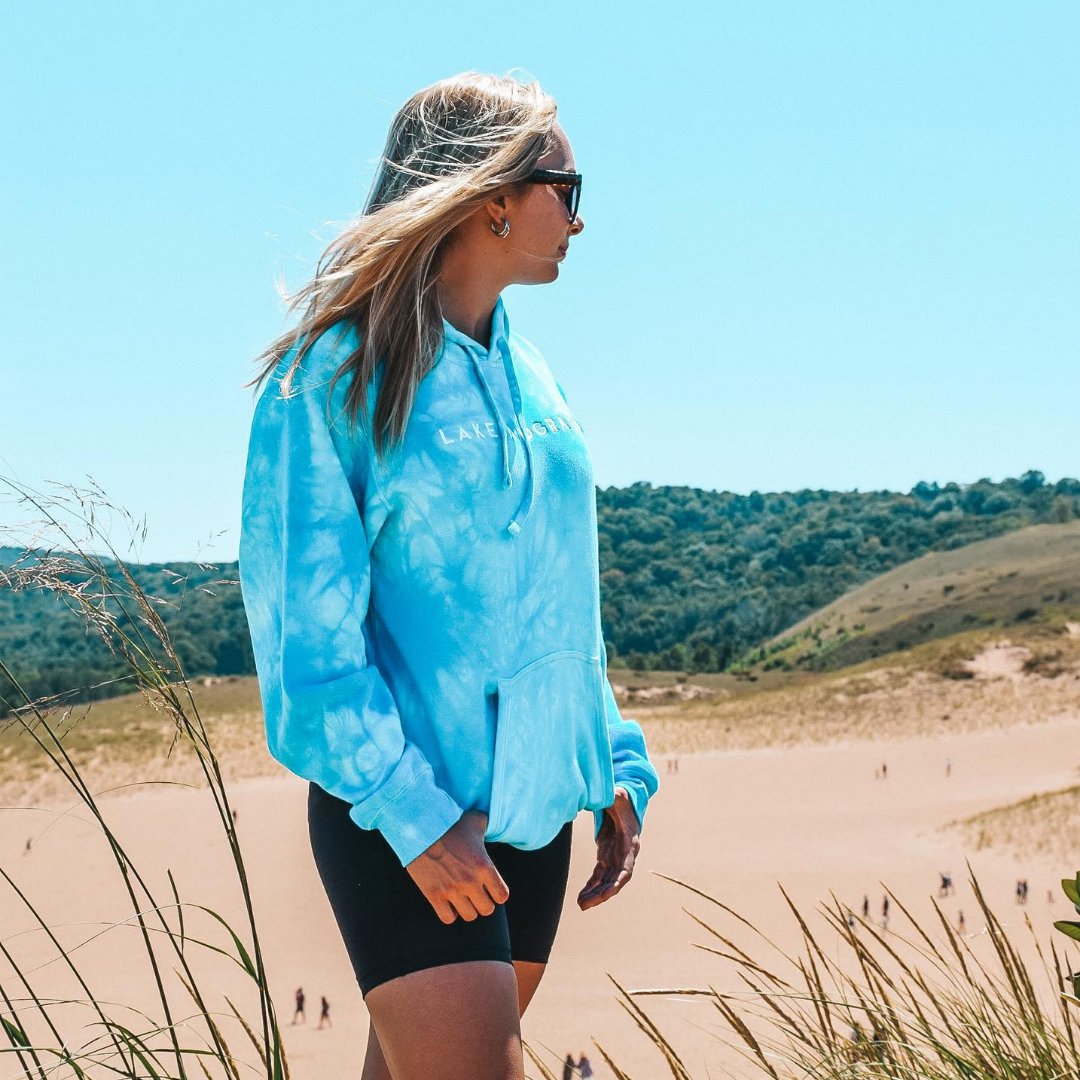 Explore the Sleeping Bear Dunes National Lakeshore in a Lakes and Grapes Tie Dye Hoodie- Daylight
