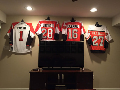 hockey jerseys hanging with jersey genius