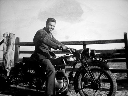 Photo of Dan's gradfather, Staff Sergeant Robert Gruber on his vintage BSA