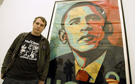 Shepard Fairey in front of his Hope Obama poster.