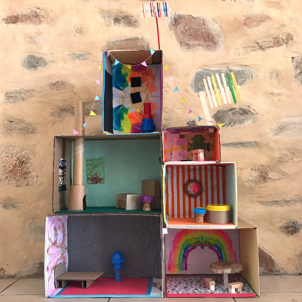 doll house made by cardboard