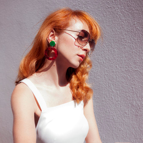 Redhead Melbourne Illustrator Kelly Thompson wearing Lucilla Gray Earrings 