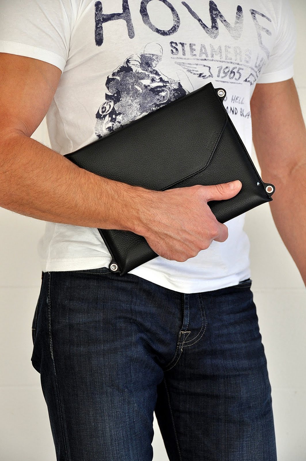 Without the strap Across is a slim portfolio case