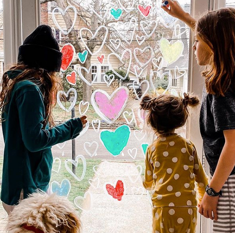 girls window painting with kwik stix