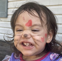 little girl with face paint 