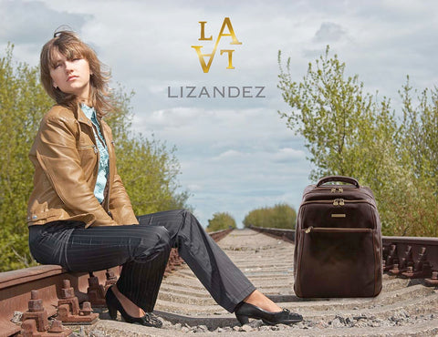 Women Sitting On A Rail Track With Much Adored Leather Backpack