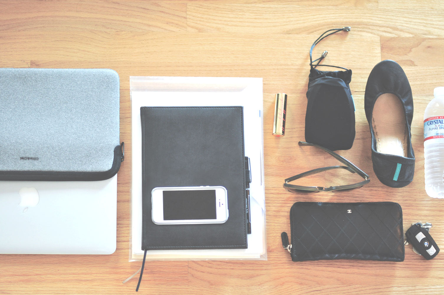 9to5Chic shares what's inside her leather laptop tote
