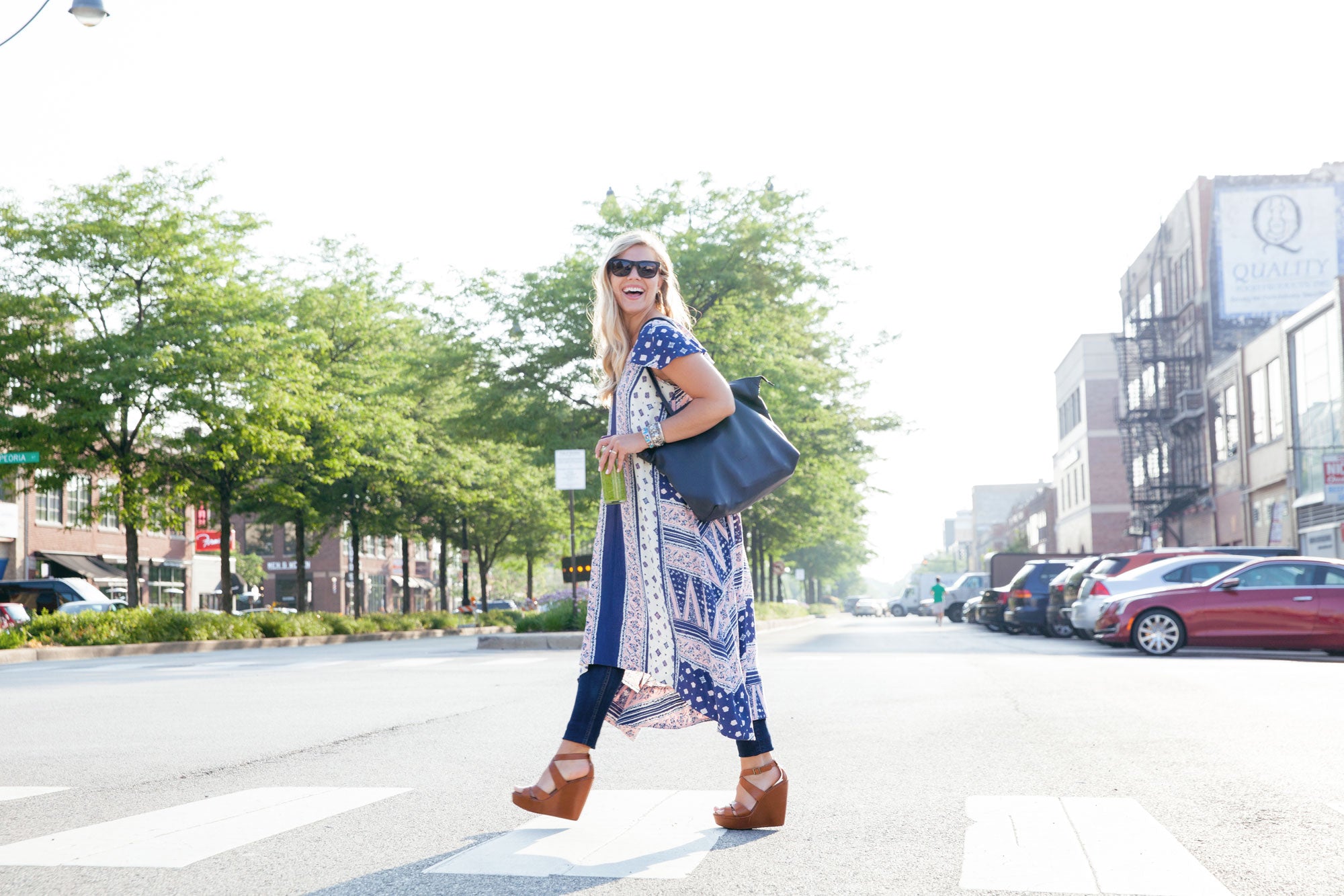 Lauren Kelp with Daame bag crossing street