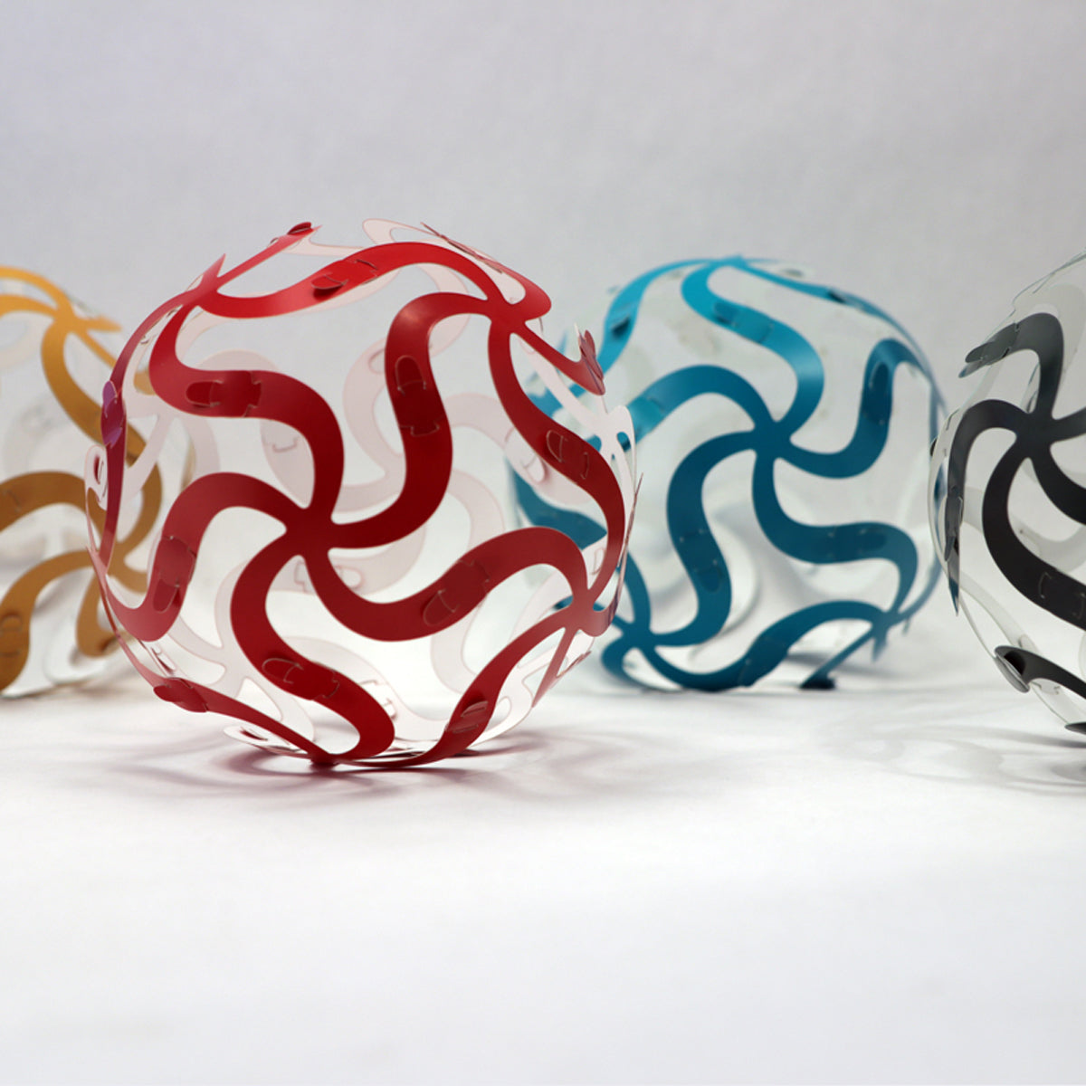 Red Curvahedra Woven Ball Puzzle Set