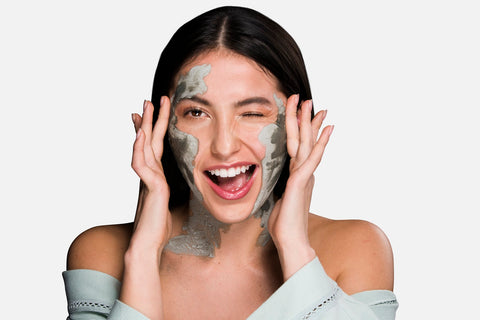 woman with NENA glacial clay mask on face, ways glacial clay helps restore youthful skin