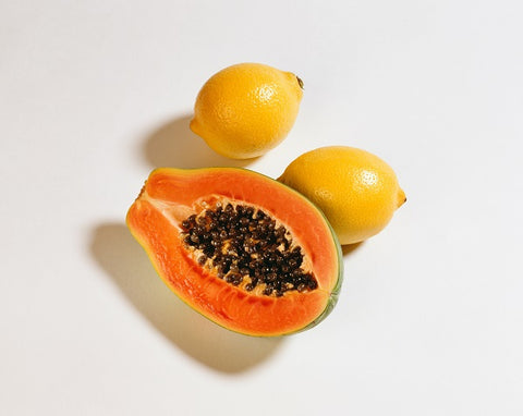 Freshly cut papaya and lemons, Natural Ways To Brighten Your Skin
