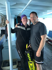 Wendy with her husband on the Naia in Fiji