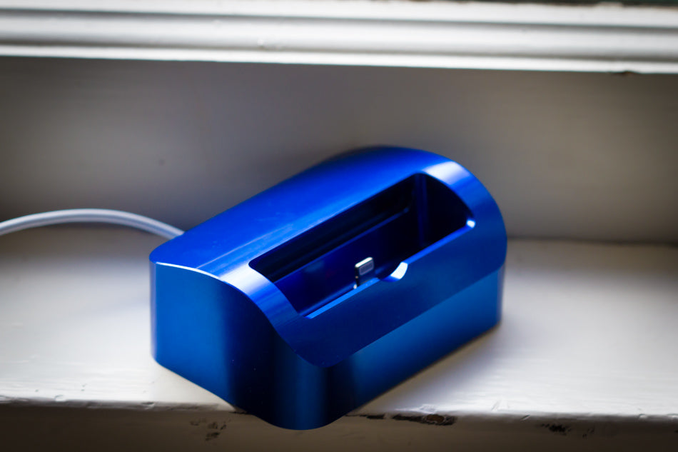 Shiny Blue Elevation Dock for iPhone 5 on window sill