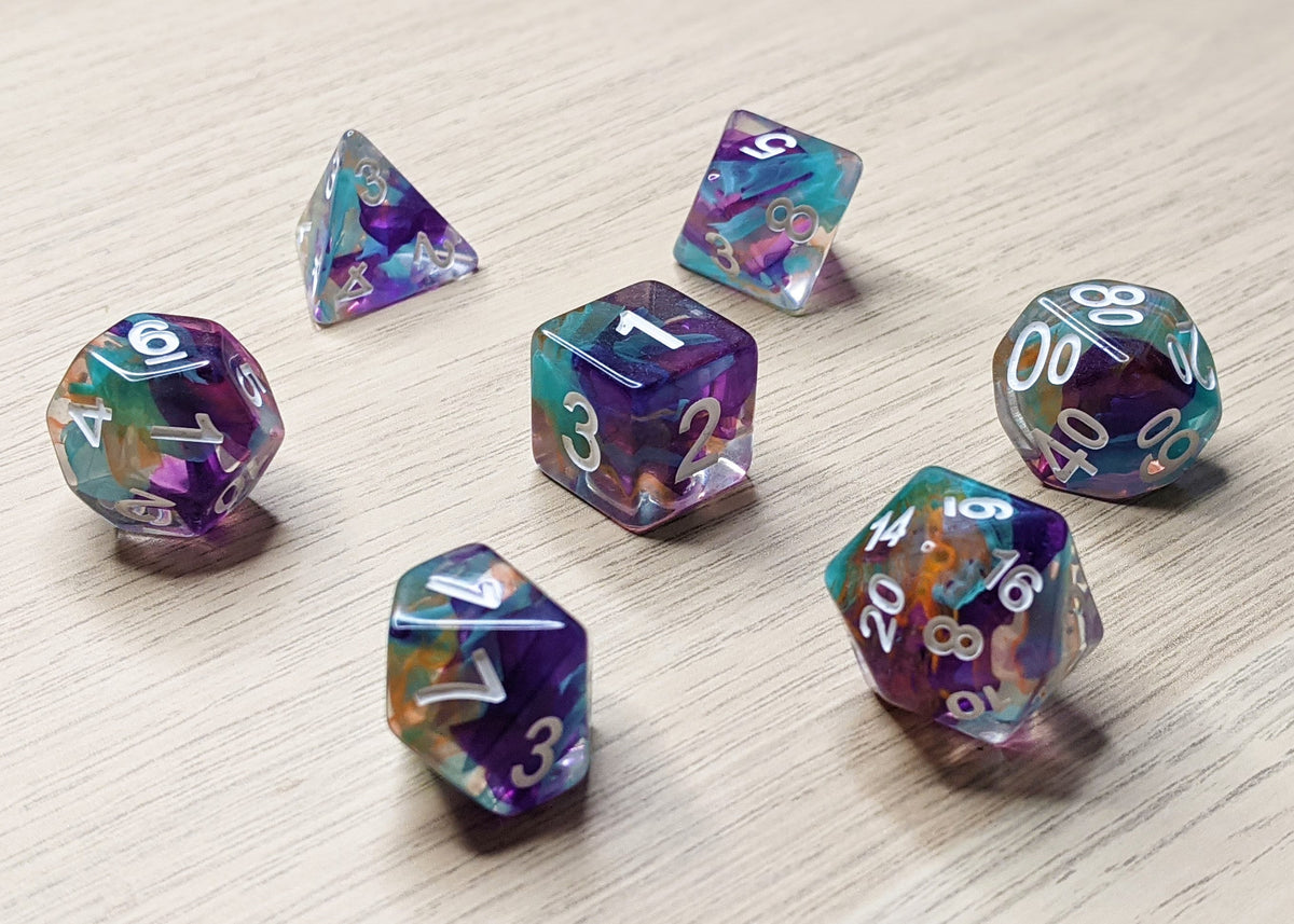 Unknown Land Polyhedral Dice Set - Clear Dice With Purple, Orange and Blue