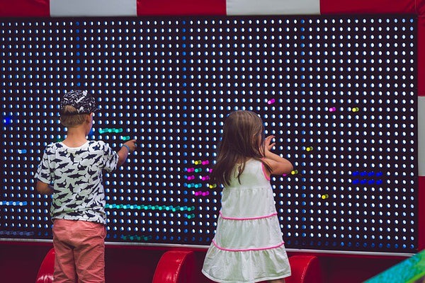 Two children play learning game