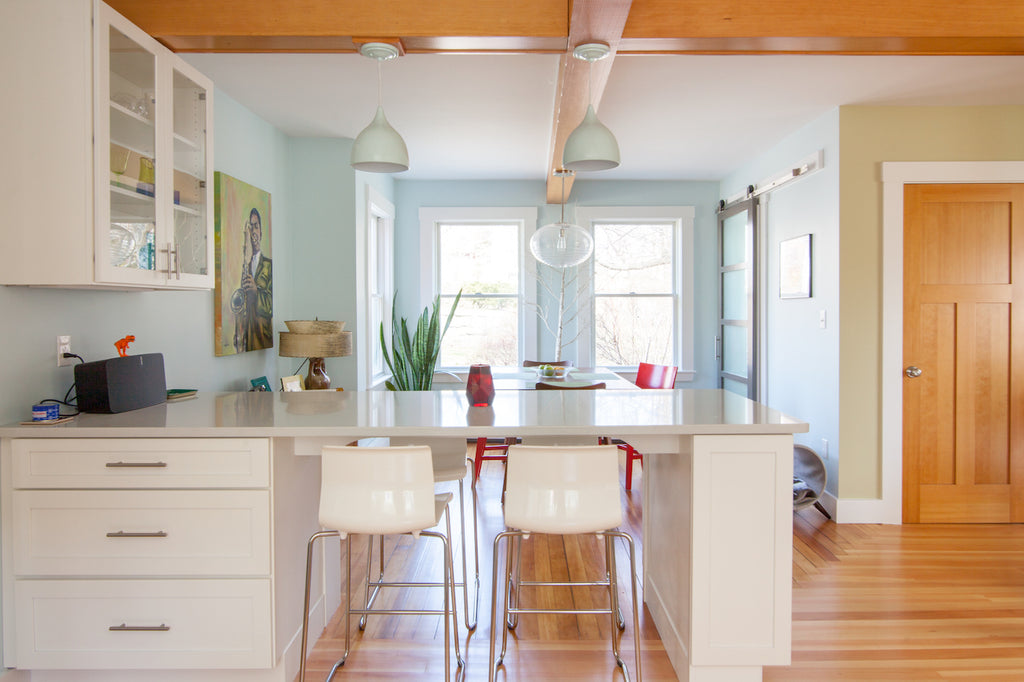 kitchen peninsula medallion cabinetry modern bar stools