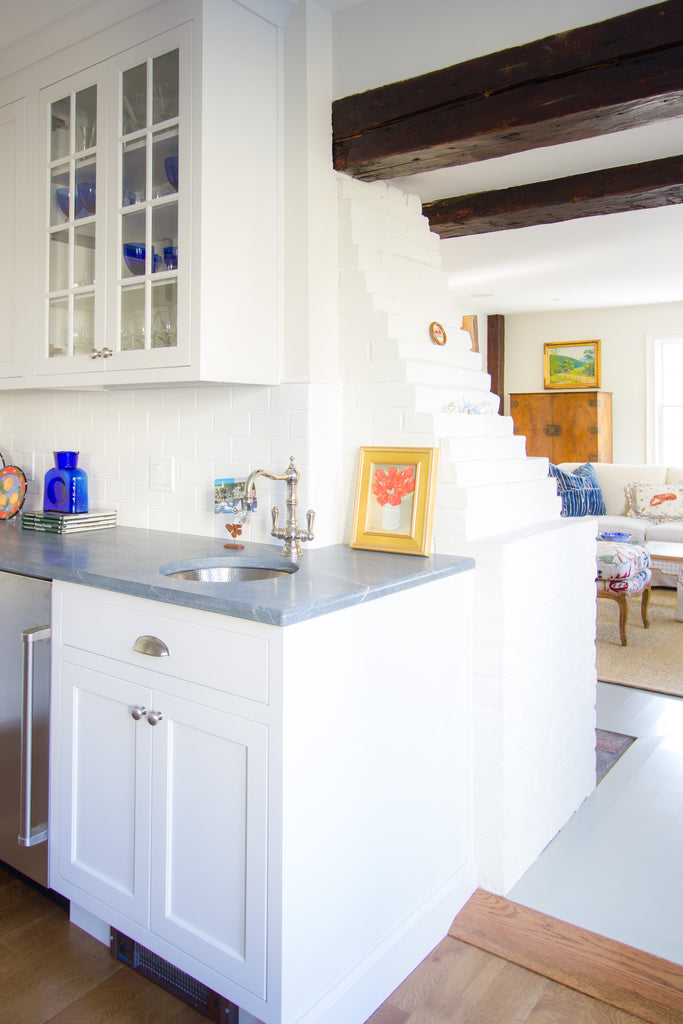exposed beams transition new england white cabinetry