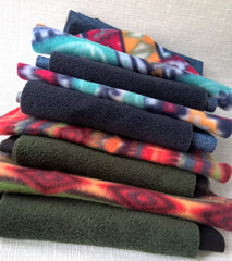 Patterned and plain fleece fabrics paired ready to make winter pillbox hats