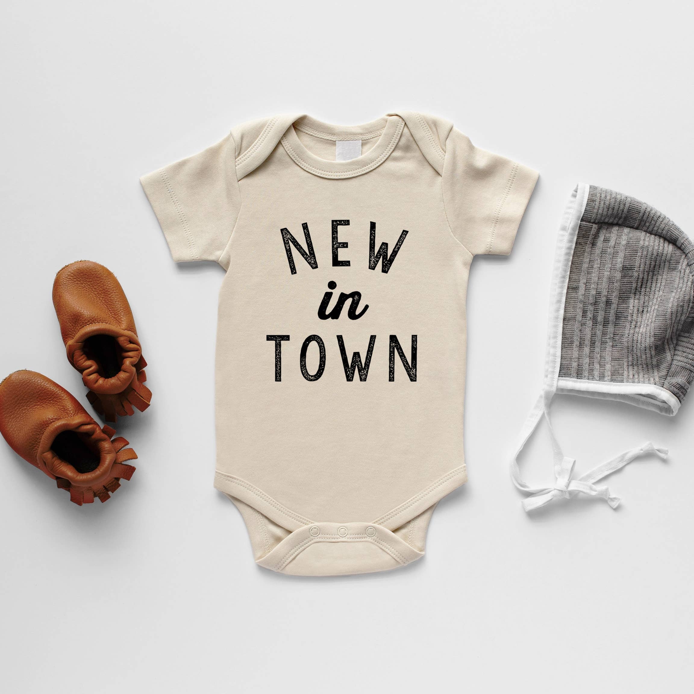 New in Town Onesie by Gladfolk
