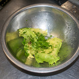 place avocado in bowl