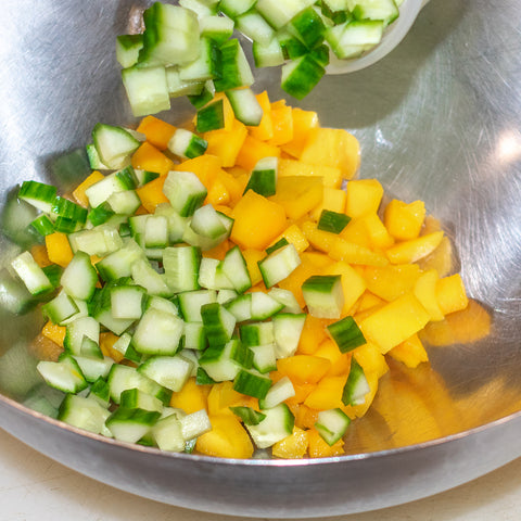 mix together mango and cucumber