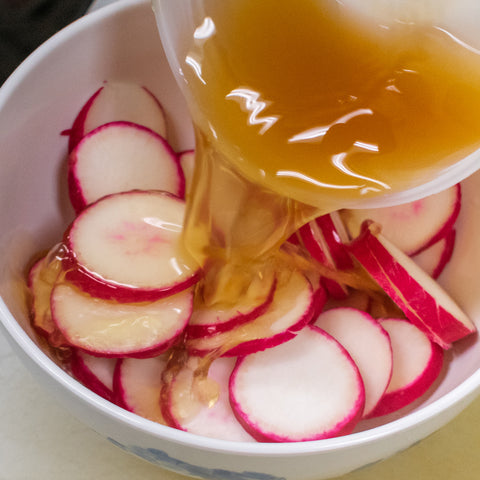 mix together radishes and vinegar