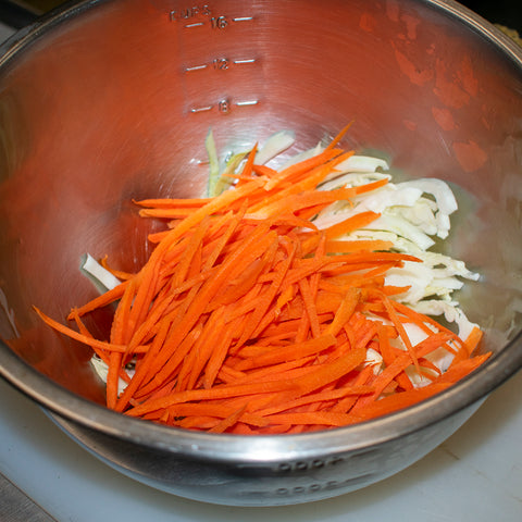 peel and julienne the carrots on a mandoline