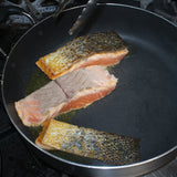 Cook the salmon skin on the grill or pan until it is crisp