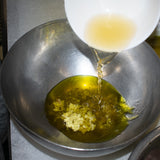 stir together olive oil and ginger dressing