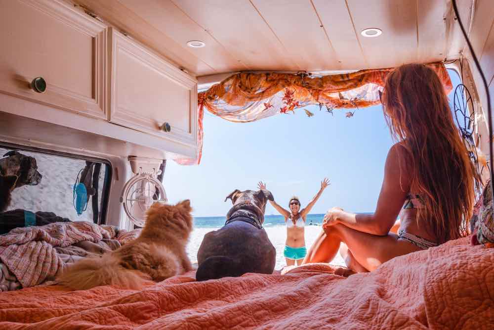 Red interior of van on the beach