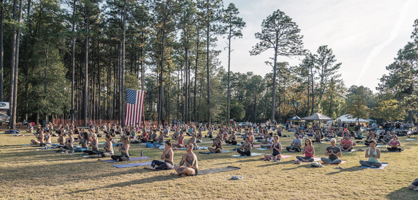 yoga in a field