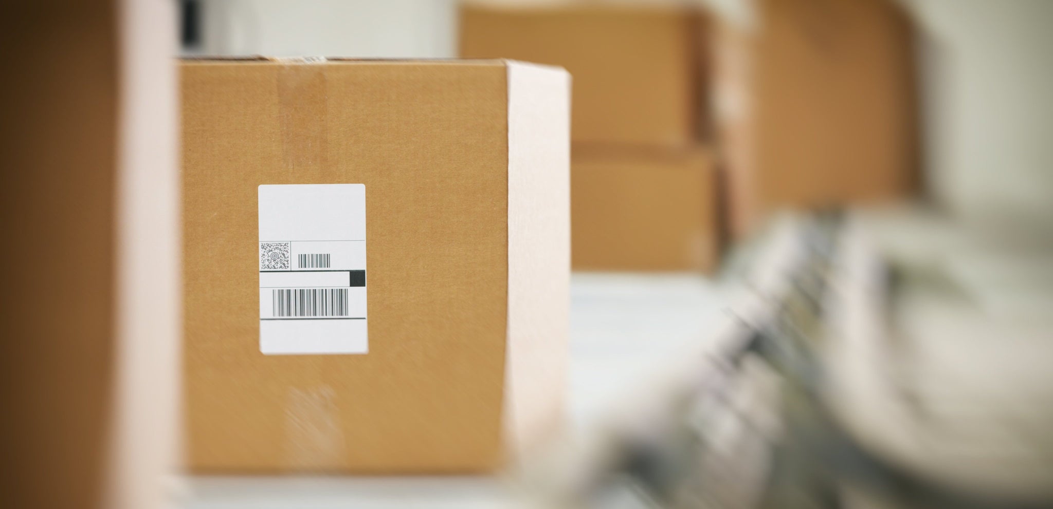 Stock image of boxes being packed