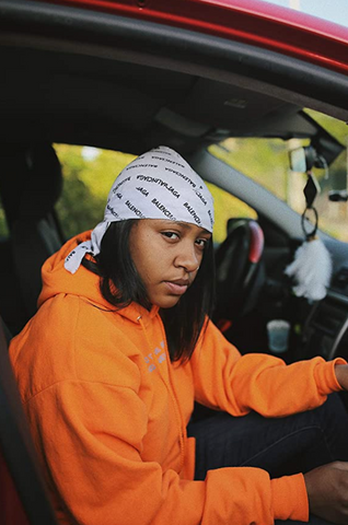 woman wearing a balenciaga durag