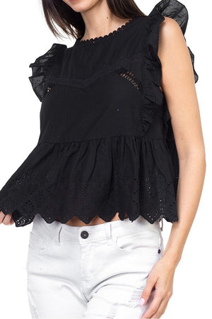 Sleeveless ruffle trim eyelet top