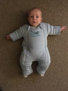 merlin's magic sleepsuit at 2 months