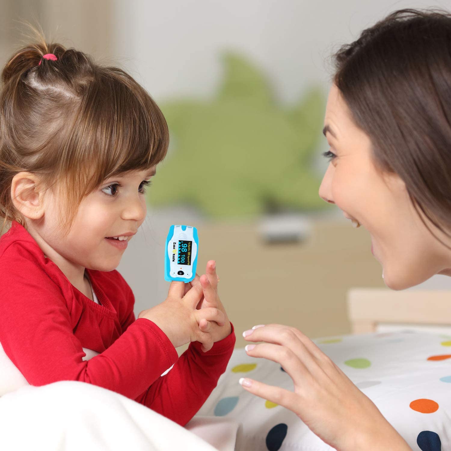 A child with her mother using the Zacurate Children Pulse Oximeter 