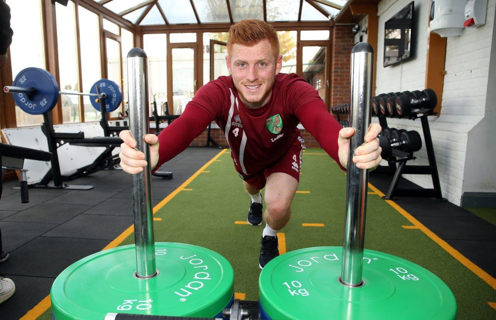 Porfessional Footballer Harrison Reed using the newly installed Jordan Fitness equipment at the Norwich City Football Club gym