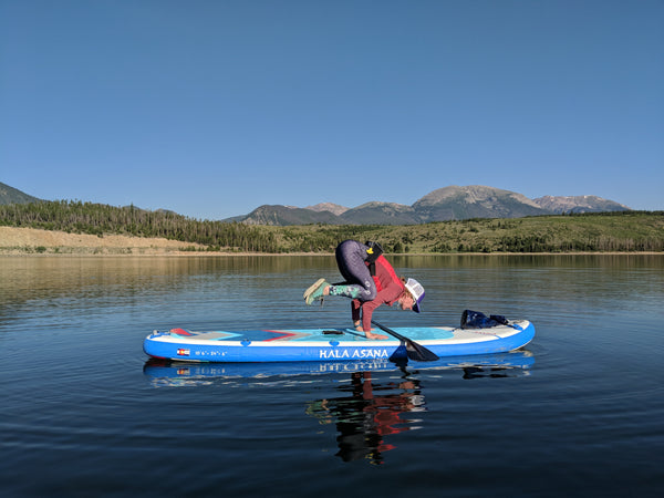 sup yoga crow lake colorado woman