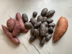 Purple sweet potatoes, blue potatoes, and yams- examples of what can be used in this recipe.