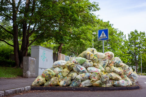 A pile of trash piled on a street. Photo credit - Jasmin Sessler.