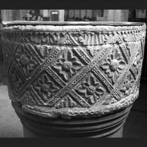 A photo as the Norman font looks today. 