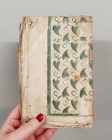 18th Century book with a similar pattern to the wallpaper example, with some differences. Photo courtesy of suives_le_fil via Instagram.