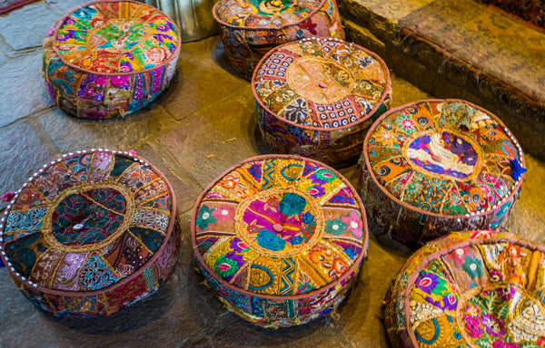 colorful meditation pillows on the floor